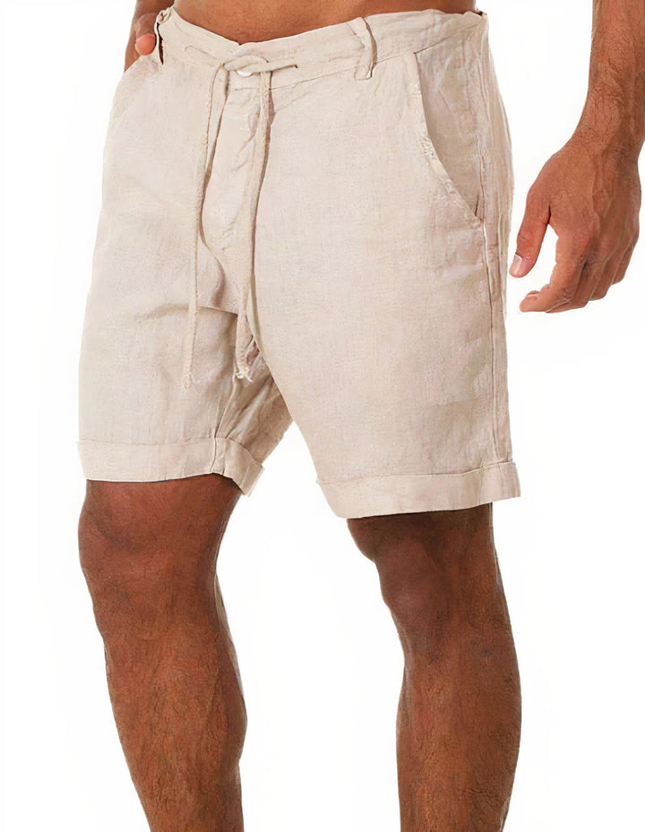 Full view of men's drawstring chino shorts in neutral tone showing relaxed fit and mid-length design