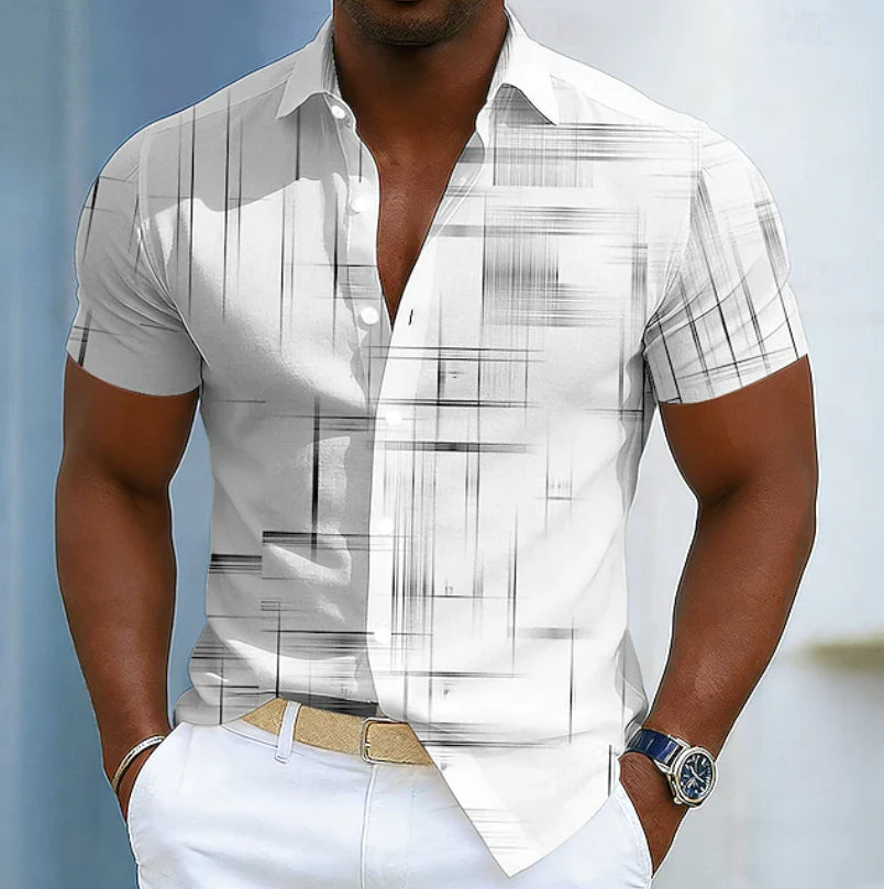 Close-up view of geometric print pattern with gold and white linear details on men's button shirt