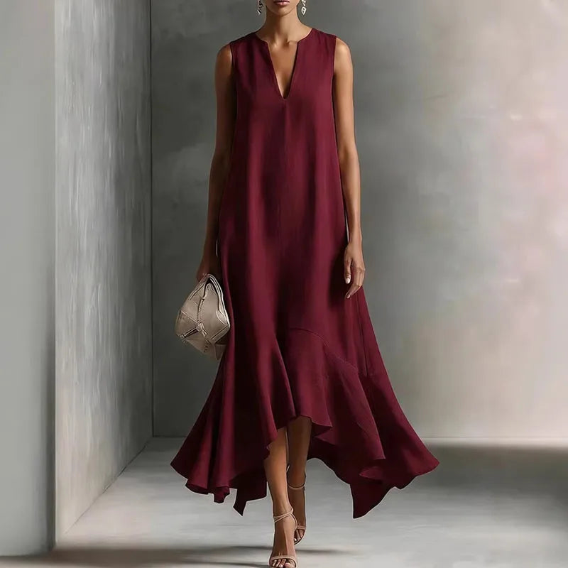 V Neck Flowy Sundress styled with strappy heels showing elegant drape and ruffle hem