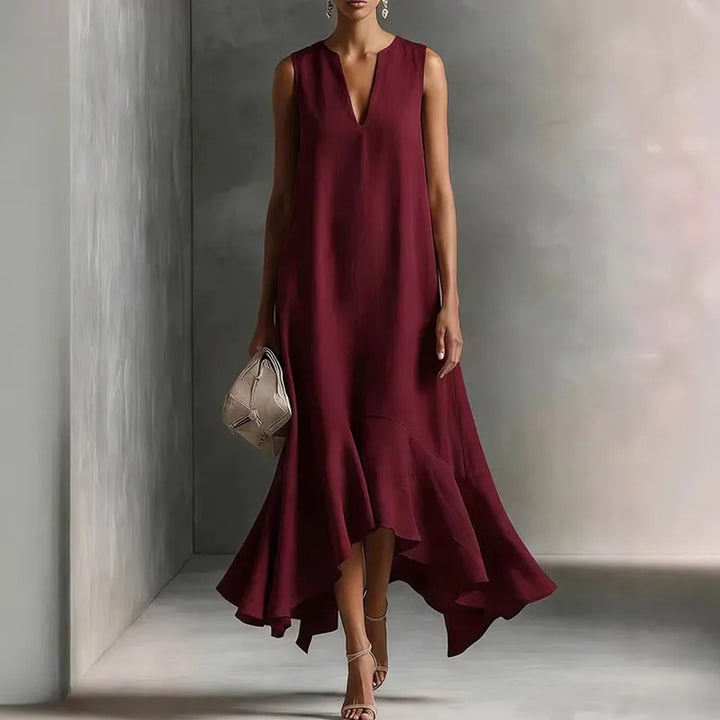 V Neck Flowy Sundress styled with strappy heels showing elegant drape and ruffle hem