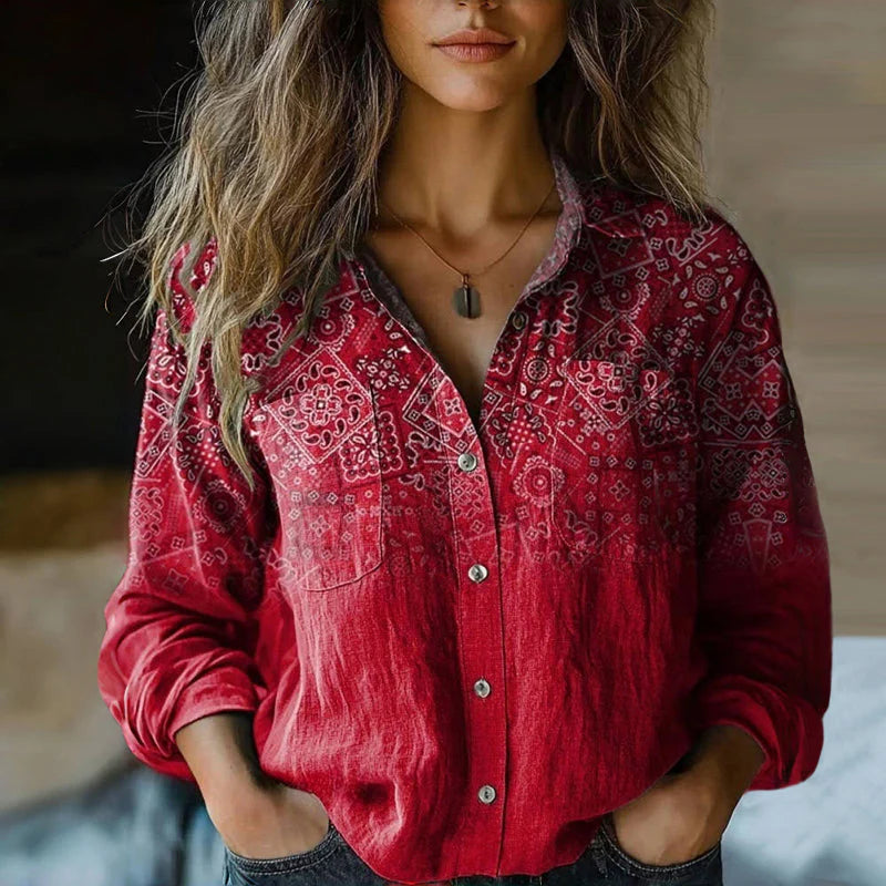 Women's bohemian print button-front blouse with collared neckline and ornamental floral pattern in red tones