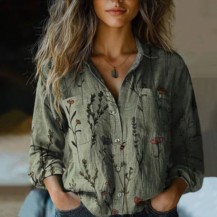 Close-up view of women's bohemian blouse showing button-front closure and relaxed fit through torso