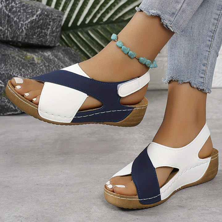 Women's Comfortable Orthopedic Sandal with navy and white crossover straps, contoured footbed, and textured platform sole