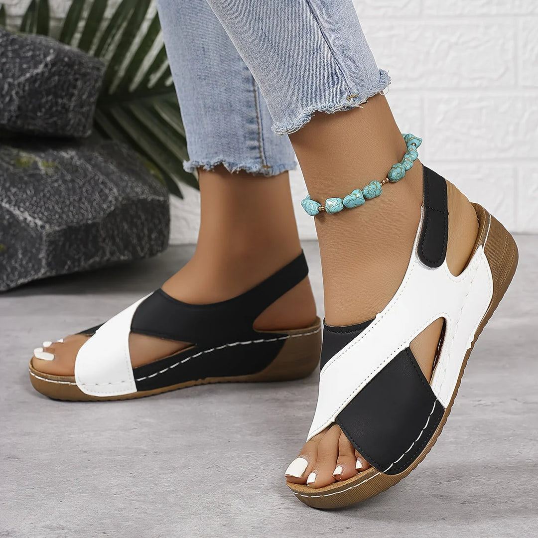 Women's Comfortable Orthopedic Sandal on outdoor surface, demonstrating textured platform sole and secure fit for walking