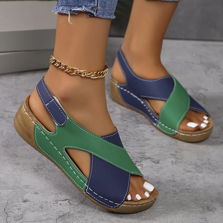 Detail of Women's Comfortable Orthopedic Sandal two-tone upper with wide straps and visible stitching on platform sole