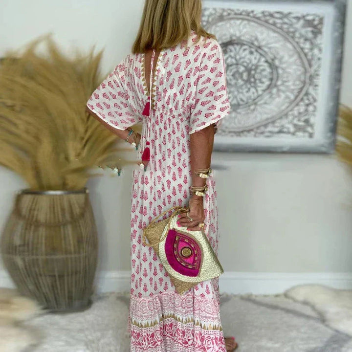 Close-up of paisley-inspired print pattern and border detail on boho maxi dress