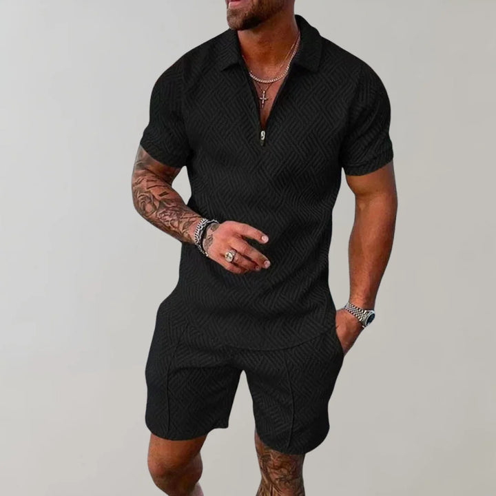 Men's textured polo and shorts set in black with geometric pattern and zip-front collar