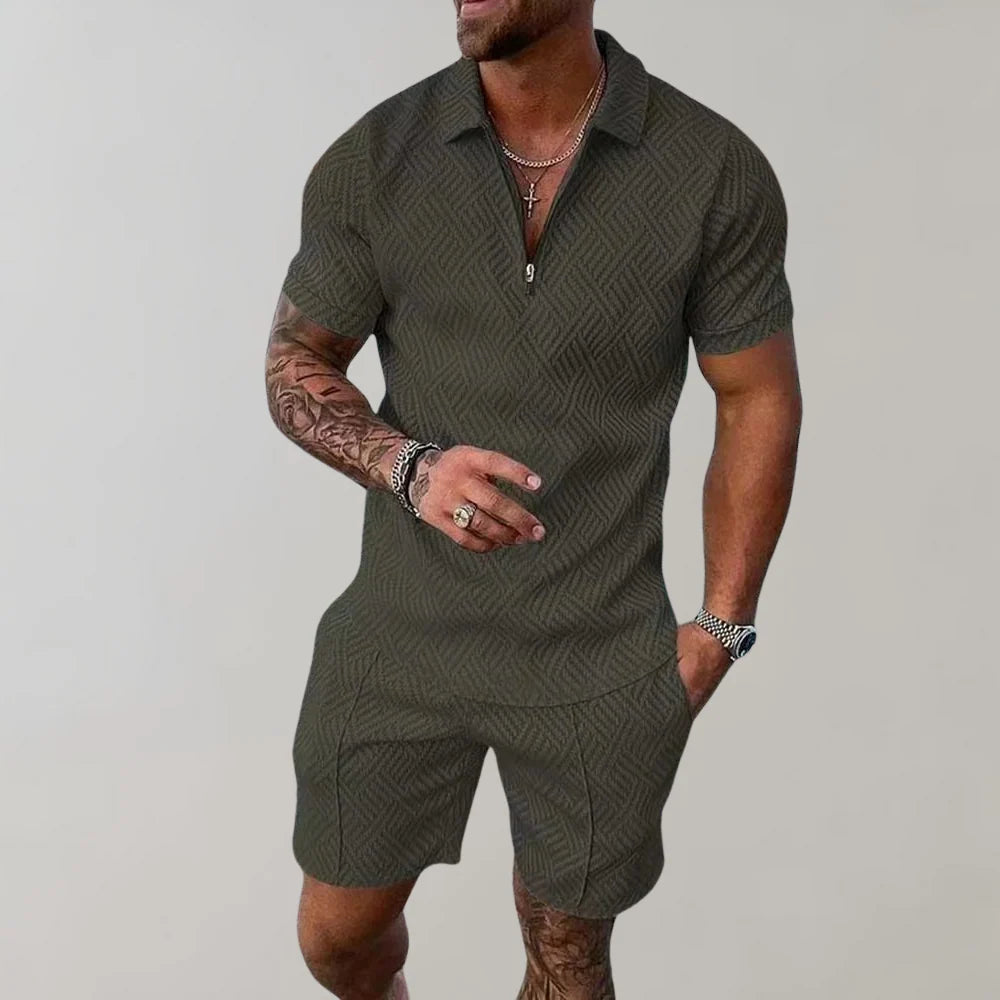 Close-up view of men's textured two-piece set showing geometric weave and short sleeves