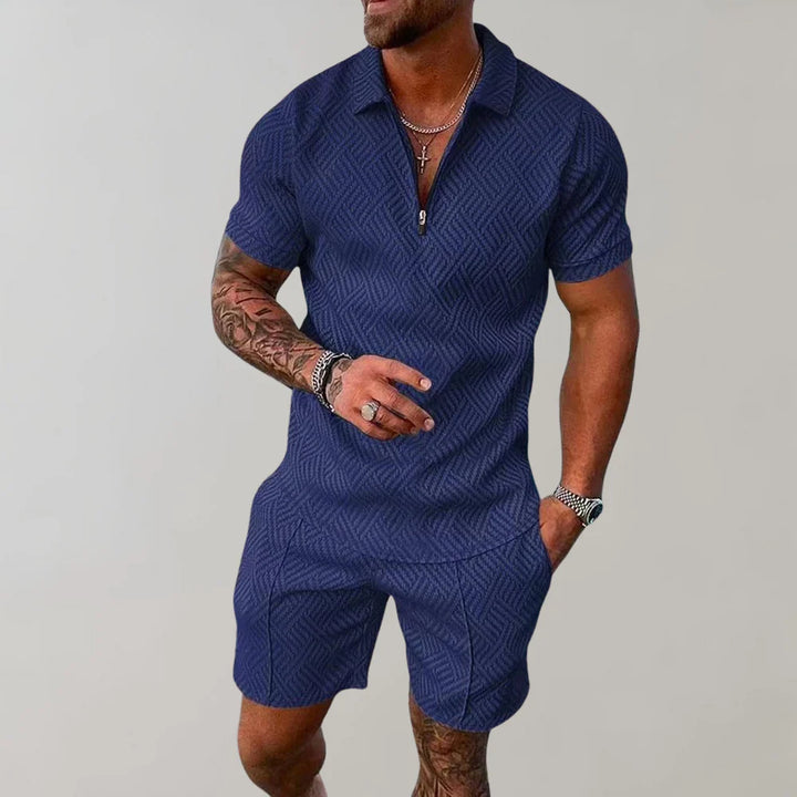 Full view of men's coordinated textured polo and shorts outfit in casual styling