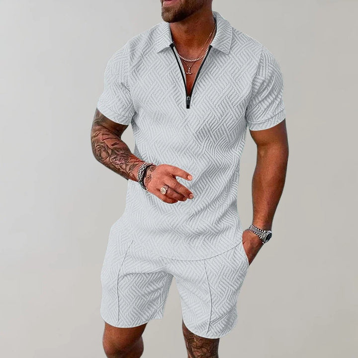 Men's two-piece polo and shorts set styled for warm-weather casual wear