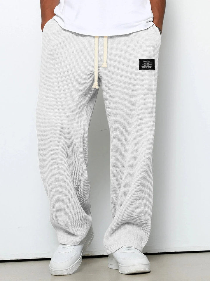 Relaxed fit waffle knit joggers showing textured fabric construction and straight leg silhouette