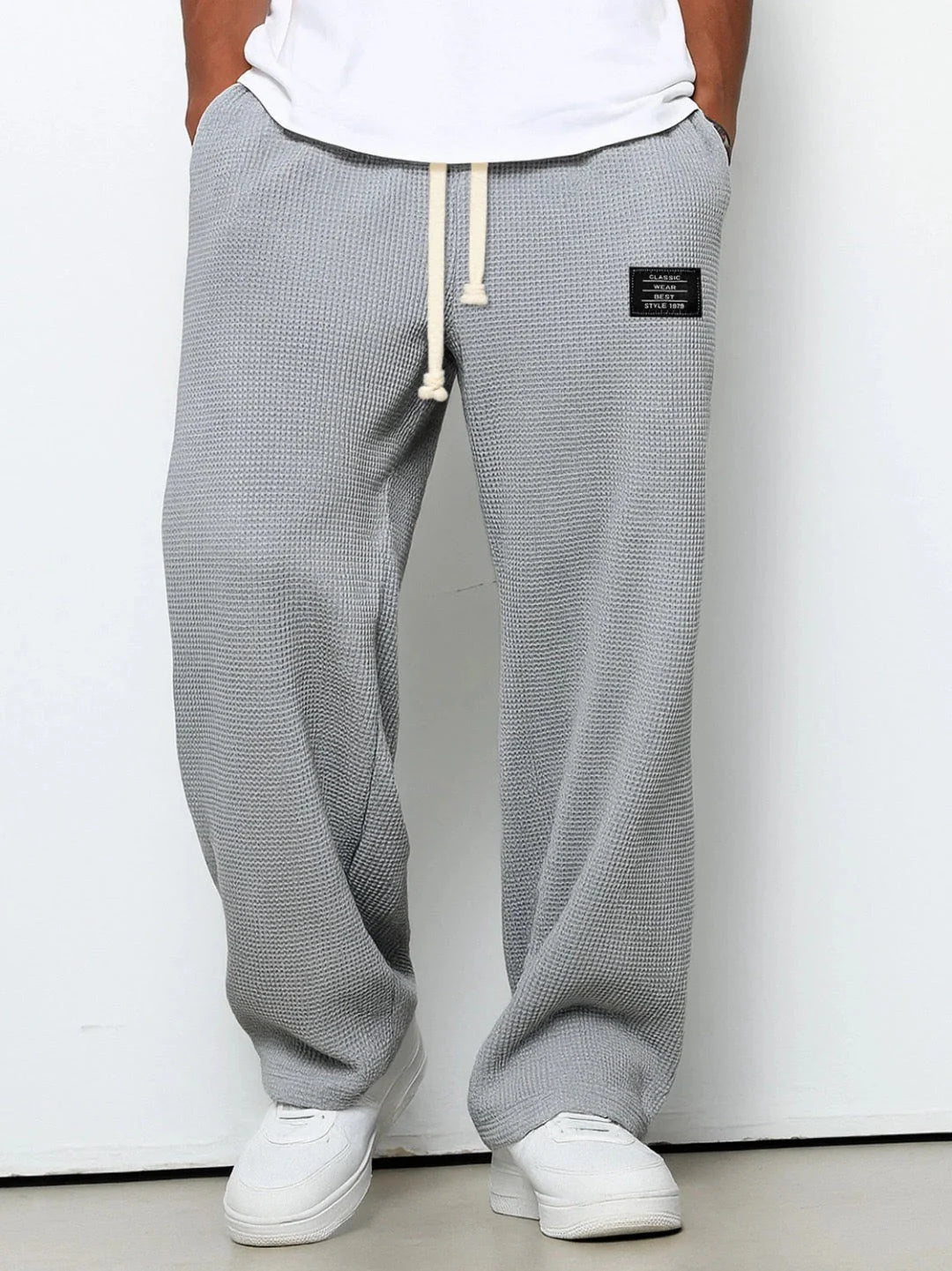 Men's casual joggers in waffle knit fabric with comfortable stretch and modern straight cut