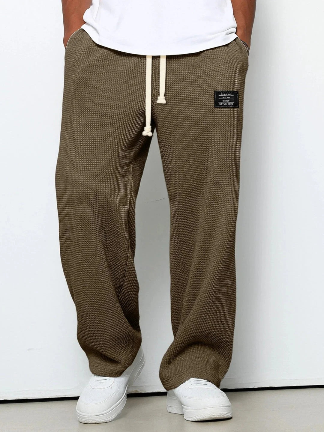 Waffle knit joggers showing comfortable relaxed fit and adjustable waistband construction