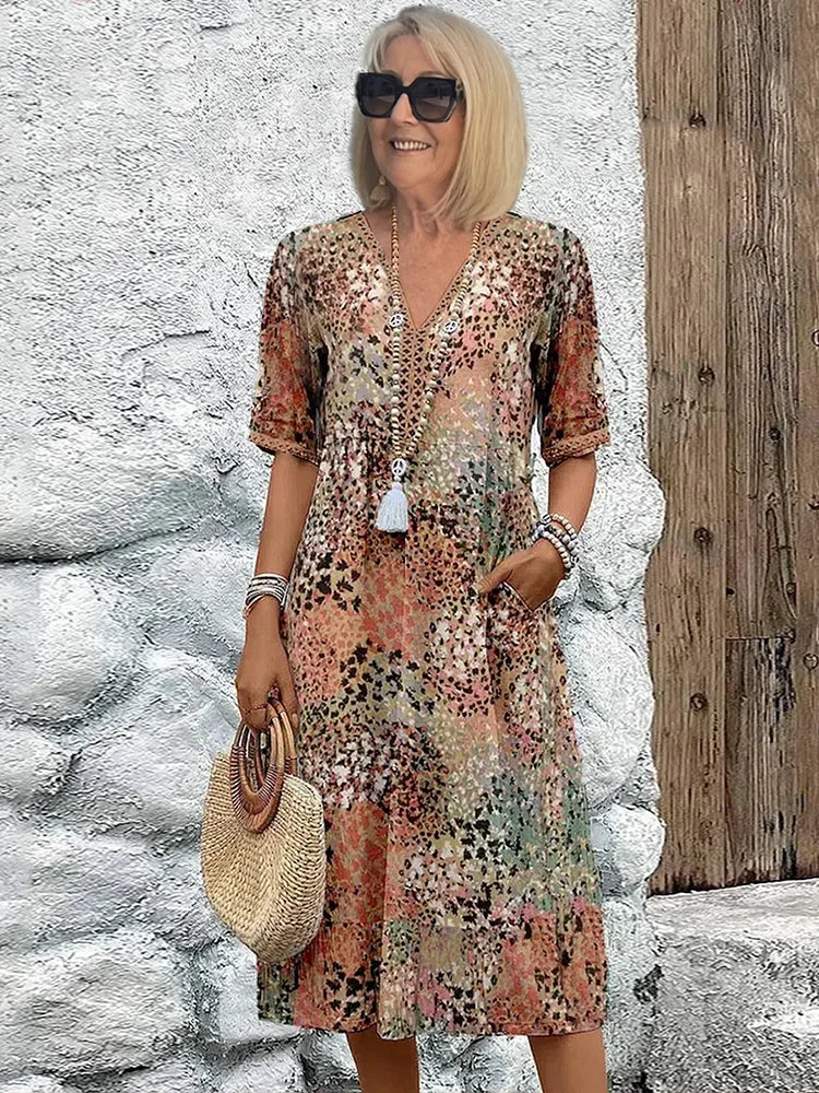 Full-length view of the cotton summer dress styled with accessories for warm-weather occasions