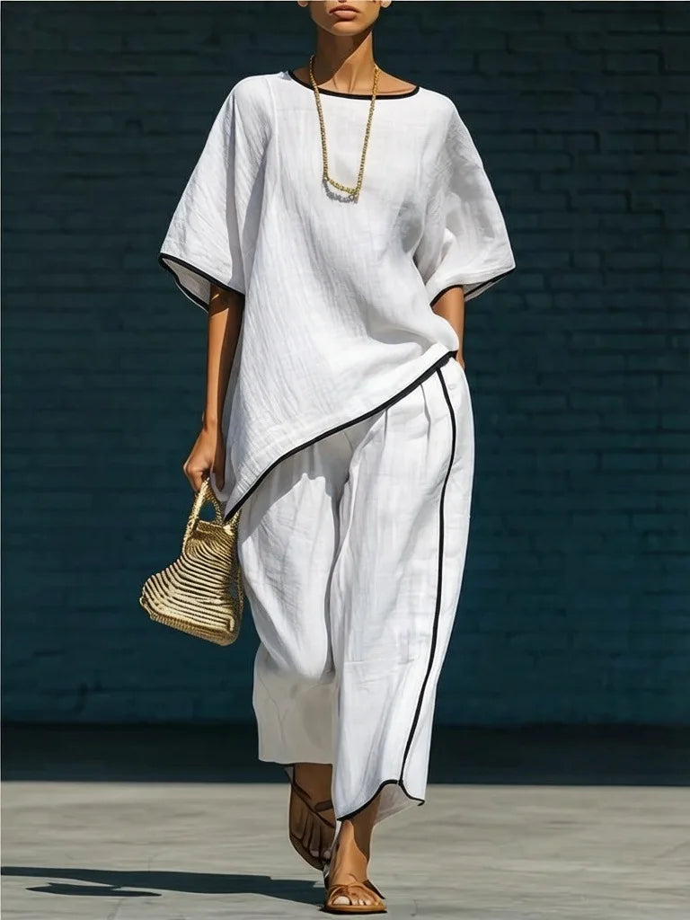 Full length view of two-piece linen set with cropped wide leg pants and oversized top