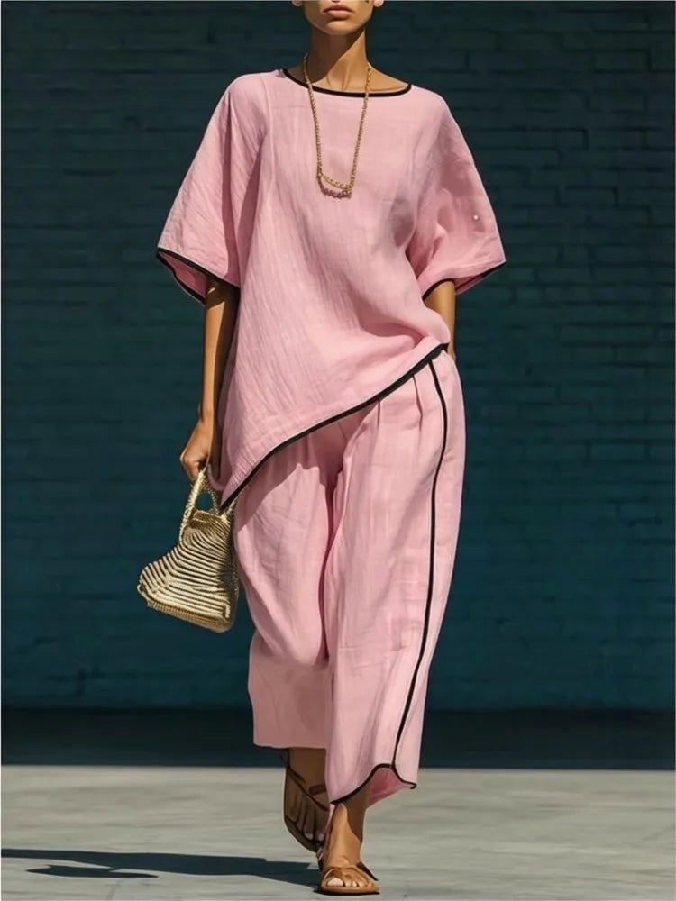 Back view of relaxed fit linen pant set showing loose drape and cropped length