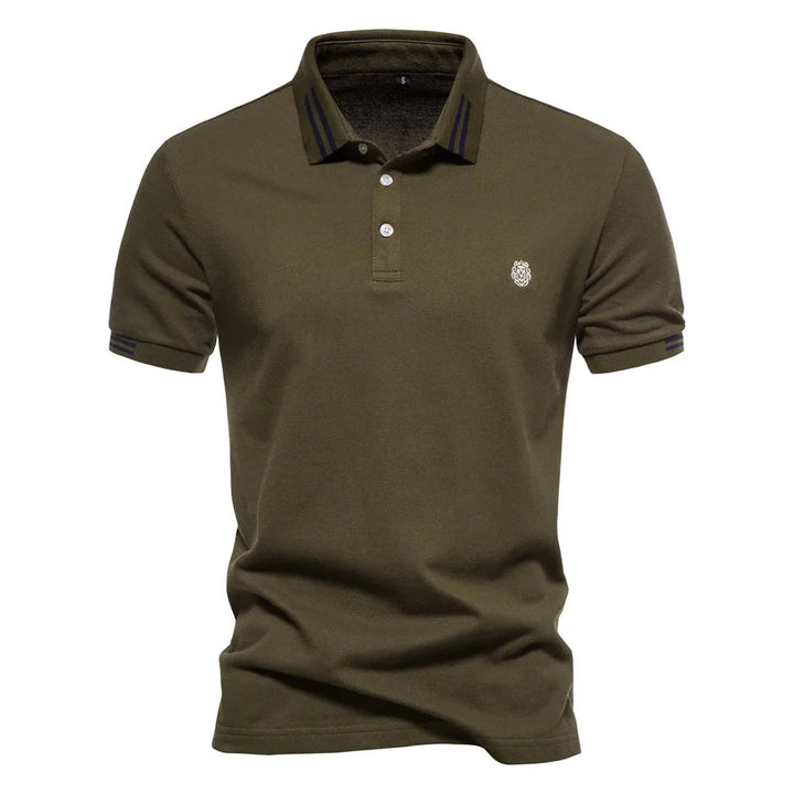 Side angle of men's navy polo shirt displaying regular fit and straight hem
