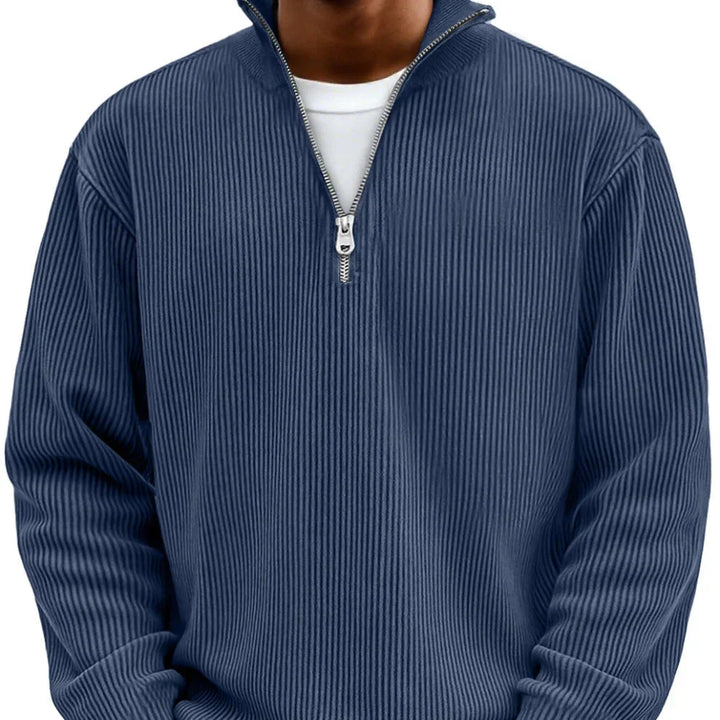 Detail shot of sweater ribbed cuffs and hem showing quality knit construction