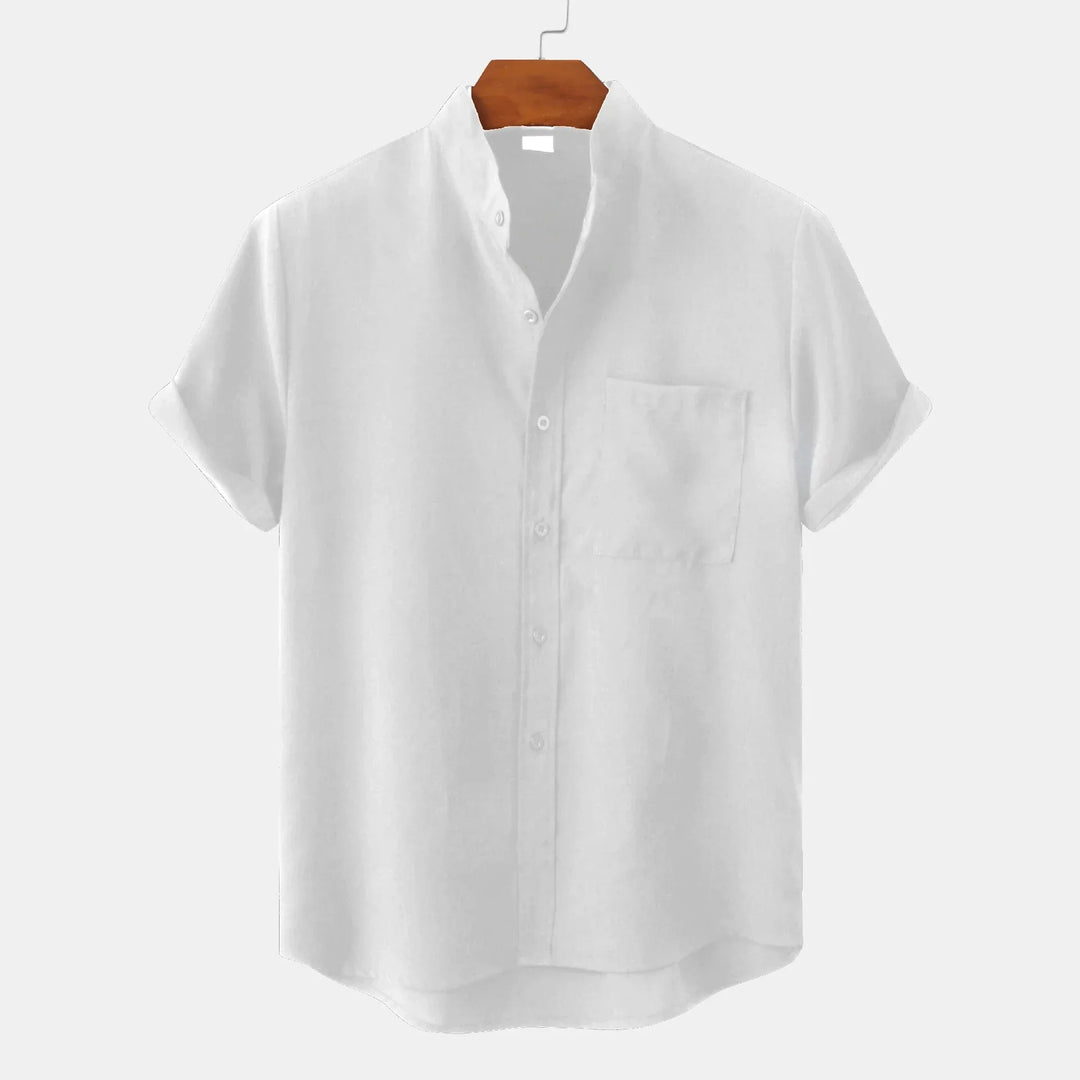 Detail shot of men's casual shirt chest pocket and button closure