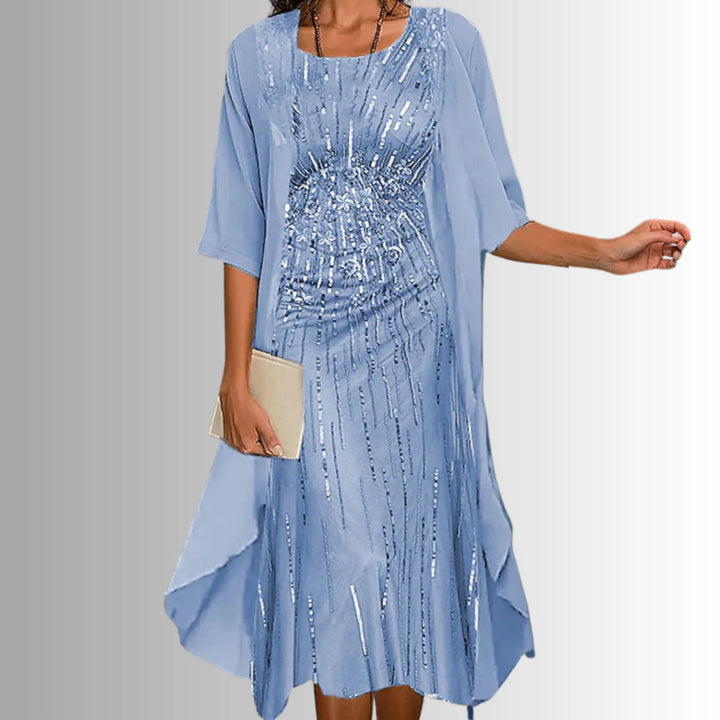 Full length view of layered midi dress with uneven hemline and relaxed fit
