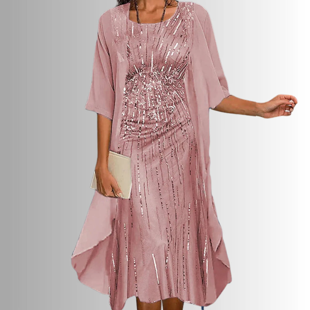 Close-up of round neckline and open front overlay construction on layered midi dress