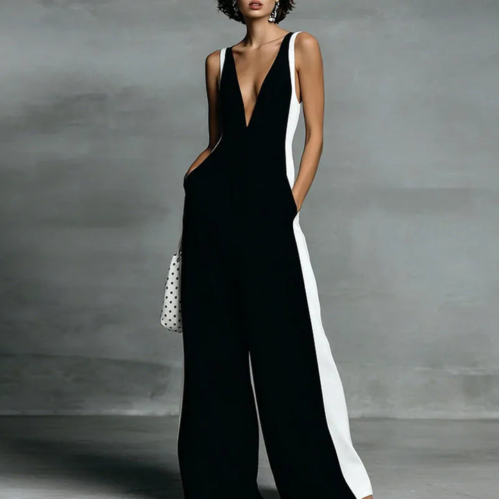 Back view of wide leg jumpsuit showing sleeveless cut and wide-leg fit with contrast panels