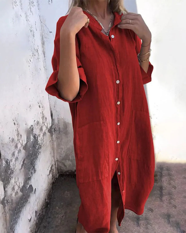 Back view of relaxed shirt dress showing smooth fabric drape and midi length