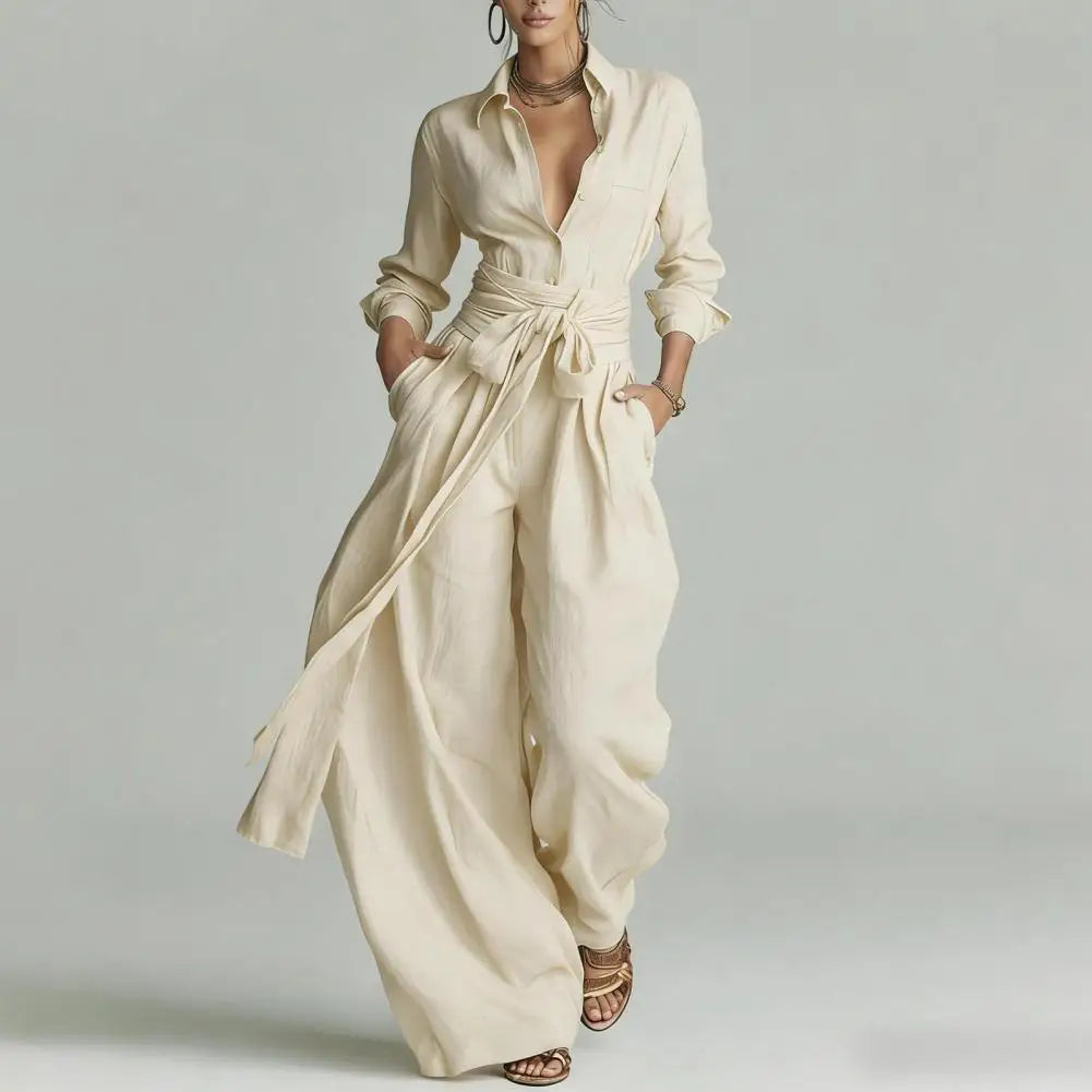 Woman wearing a cream Linen Co-Ord Set with open-collar button shirt and high-rise wide-leg pants with self-tie waist detail