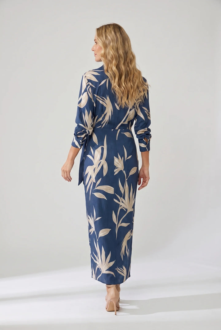 Full-length view of flowing maxi dress with botanical print and ankle-length hem