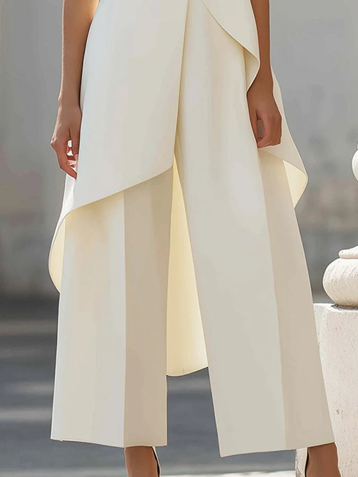 Back view of sleeveless turtleneck set showing clean lines and tailored fit