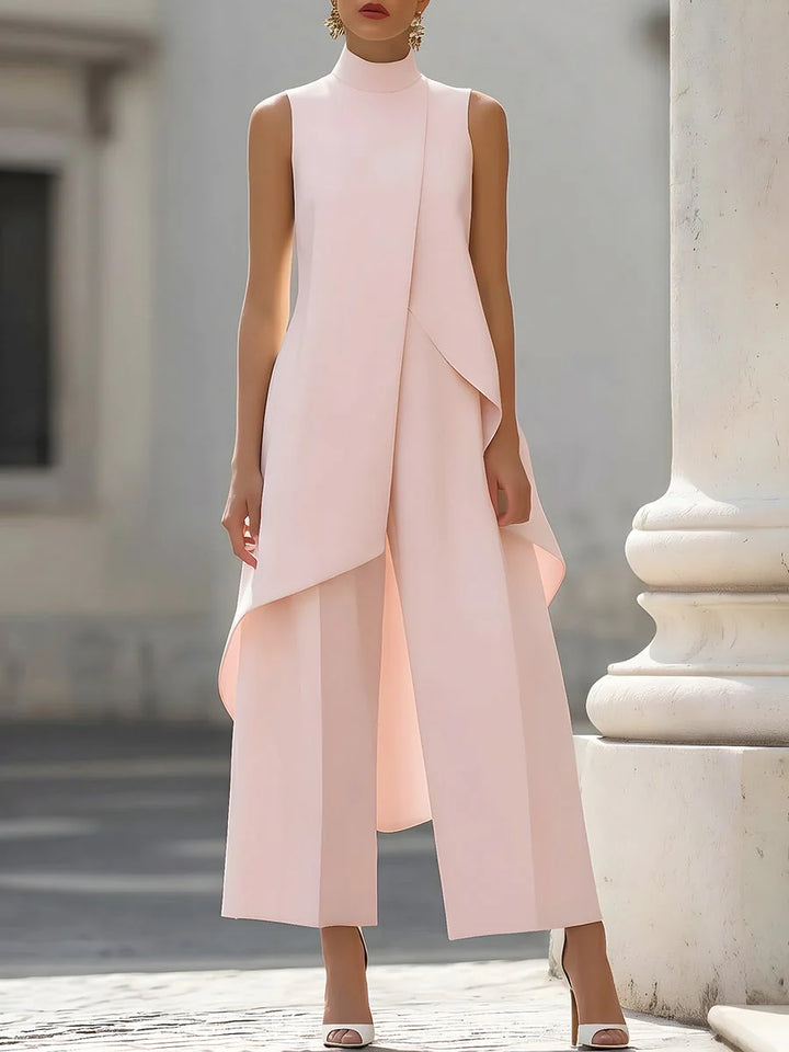 Women's two-piece set in black showing sleeveless turtleneck and wide-leg trousers