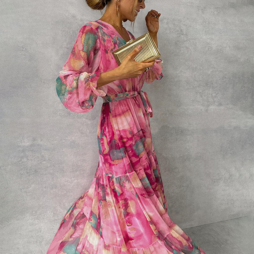 Full-length view of floral wrap maxi dress with gathered sleeve cuffs and ruffled tier seams