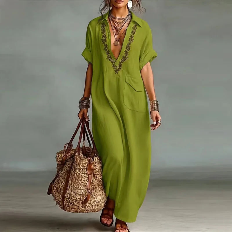 Full-length view of V neck kaftan dress styled with sandals for warm-weather occasions