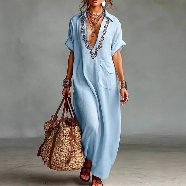 Back view of flowing kaftan dress showing relaxed fit and full-length hem