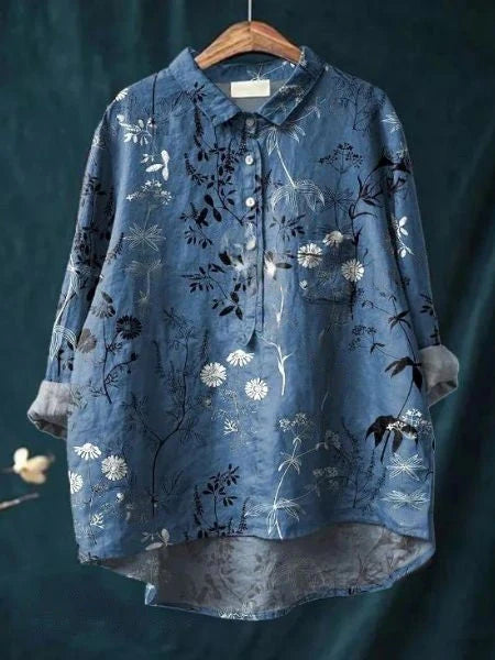 Side angle of women's relaxed fit floral print shirt on display