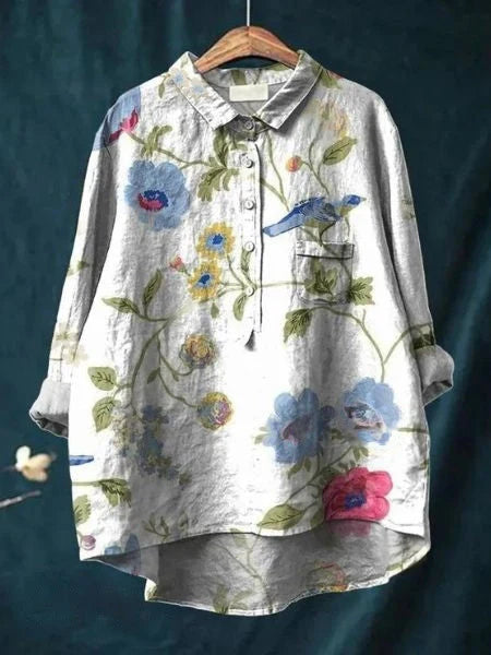 Close-up of multicolor floral print fabric on women's collared shirt