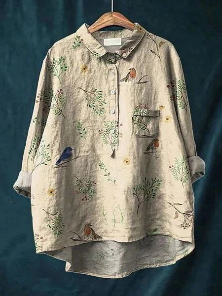 Women's button-front shirt with vibrant abstract floral design and structured fit