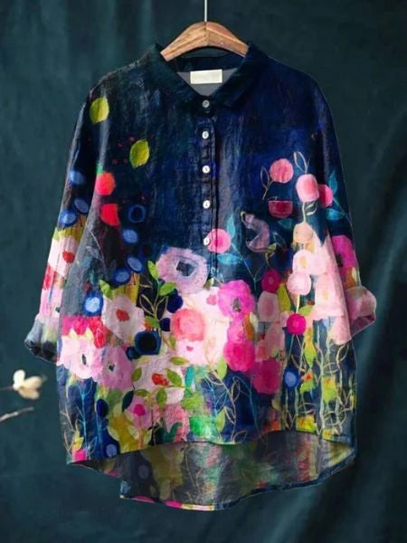 Full view of women's long sleeve floral print shirt with collared neckline