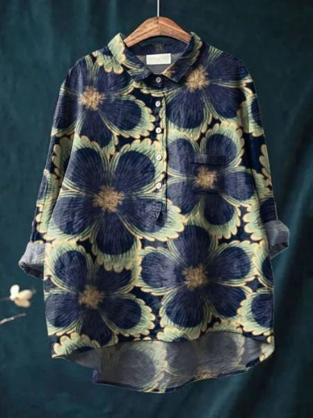 Back view of women's floral print button-front shirt showing curved hem