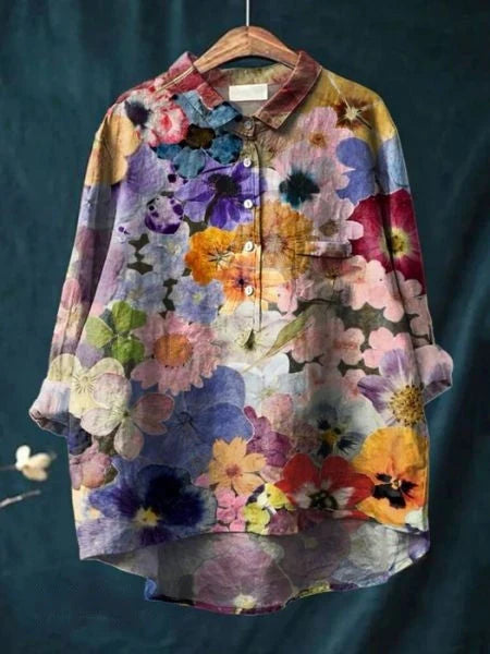 Close-up of women's shirt collar and button placket with floral pattern