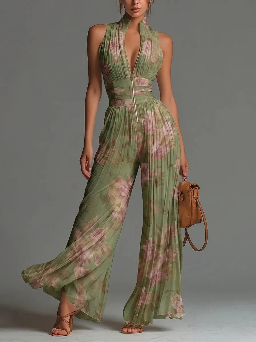 Pleated wide leg jumpsuit with halter neckline and floral print in green and pink tones for vacation styling