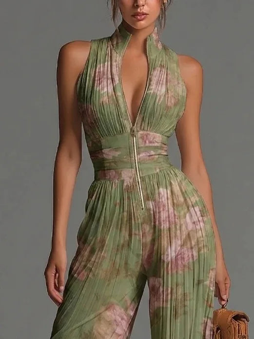 Full-length pleated wide leg jumpsuit with flowing silhouette and lightweight fabric drape for occasion wear