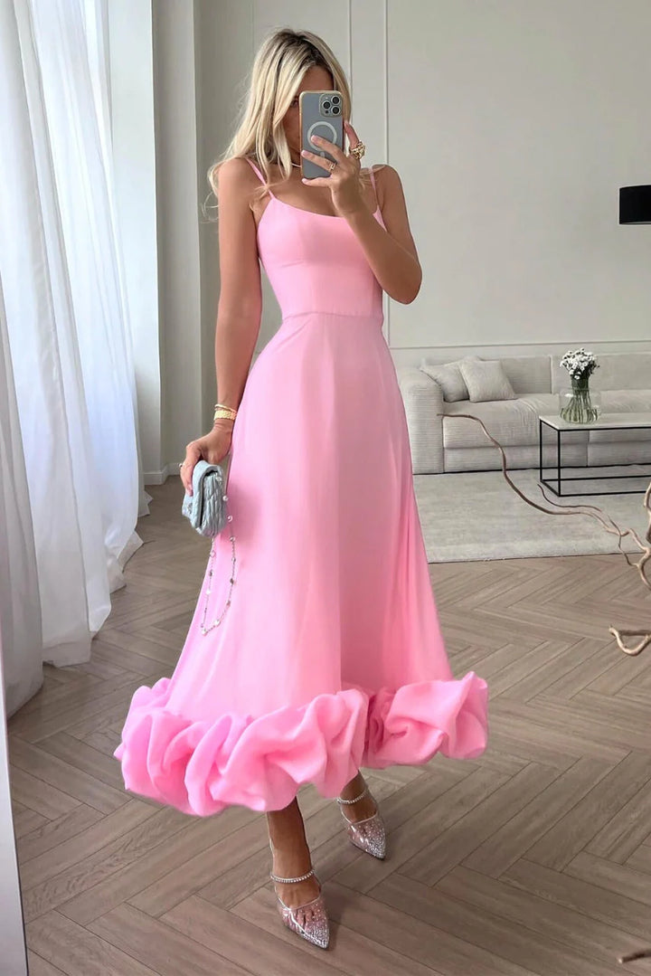 Spaghetti Strap Maxi Dress Flared Skirt Ruffle Hem in pink with fitted bodice and gathered ruffle detail at floor-length hem