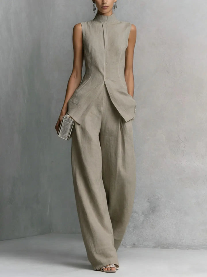 Close up view of linen pant set showing button front closure and structured fabric drape