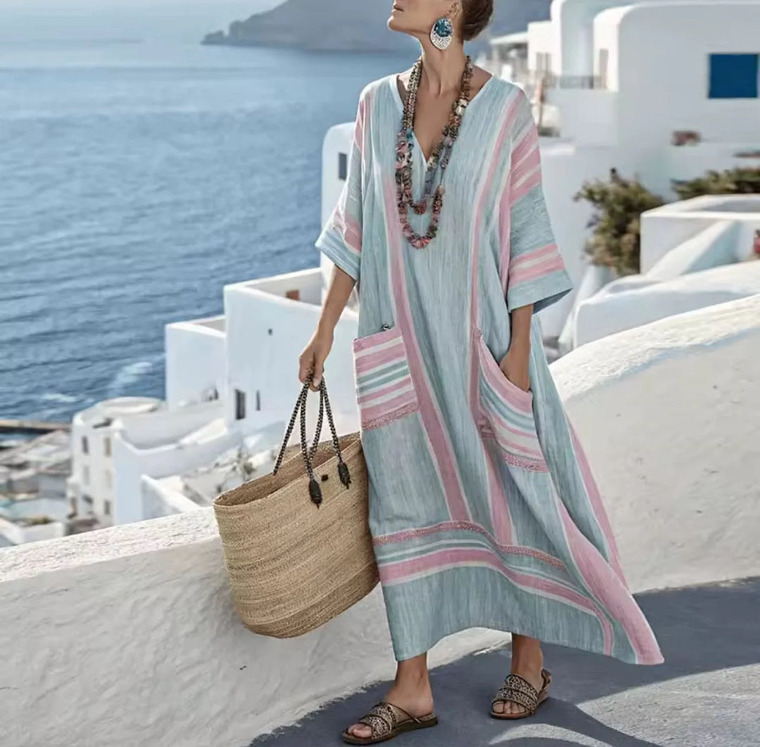 Back view of relaxed fit striped maxi dress showing loose silhouette and ankle length