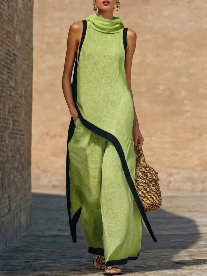 Detail of elastic waistband on wide leg linen trousers with contrast trim