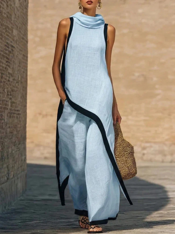 Model wearing white linen two piece set in outdoor setting with natural light