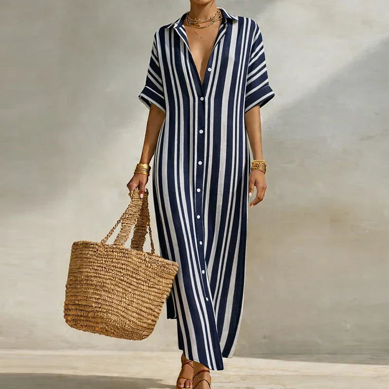 Close view of vertical stripe pattern and button-front closure on relaxed fit shirt dress with short sleeves