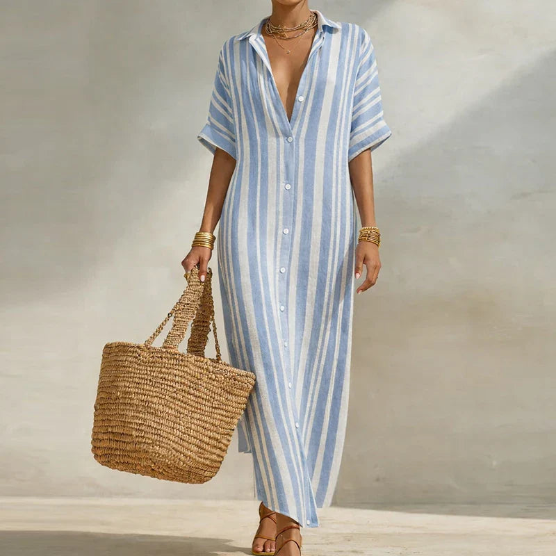 Detail of woven fabric texture and short sleeve construction on casual long shirt dress