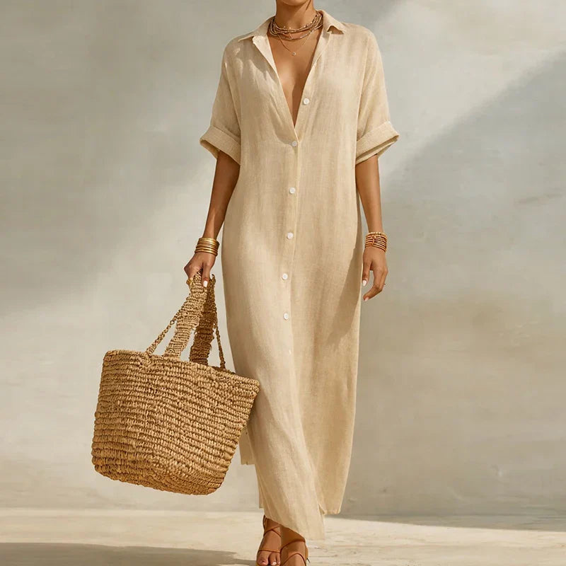 Full-length view of striped maxi shirt dress styled with flat sandals for warm weather